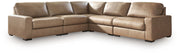 Benchcraft Veronella stationary sectional sofa with plush cushions and modern design, shown in a stylish living room setting.