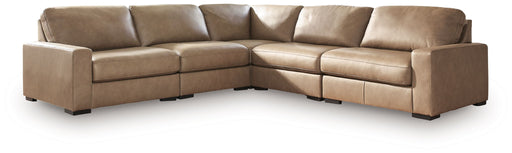 Benchcraft Veronella stationary sectional sofa with plush cushions and modern design, shown in a stylish living room setting.