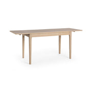 Classic Home Karl extendable coastal drift writing desk with sleek wood finish and adjustable surface in a modern workspace setting.