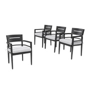 Set of four Life Outside outdoor patio dining chairs with black frames, tapered feet, and Sunbrella fabric cushions.