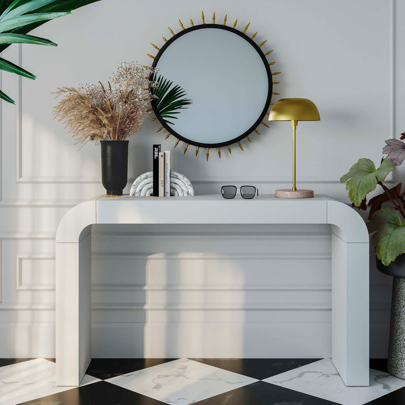 TOV Furniture Hump console table with a sleek wooden top and metal frame, ideal for entryways or living spaces.