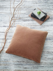 Signature Design by Ashley Jaxkins throw pillow with plush fabric and decorative pattern, ideal for sofa or bed decor.