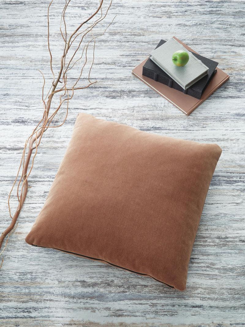 Signature Design by Ashley Jaxkins throw pillow with plush fabric and decorative pattern, ideal for sofa or bed decor.