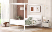 DreamHaus canopy platform bed with headboard, footboard, and slat support legs in a stylish bedroom setting.