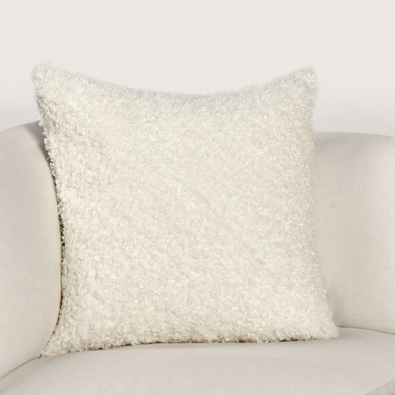 Ivory Carter's accent pillow by Classic Home, 22x22 inches, featuring soft fabric and decorative stitching for cozy home decor.
