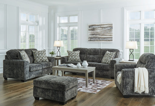 Signature Design by Ashley Lonoke living room set with stationary sofas and loveseats, featuring plush fabric and modern design.