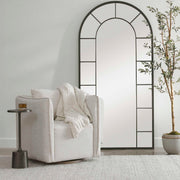 Silver Corben swivel armchair by Uttermost featuring a modern design and plush upholstery.