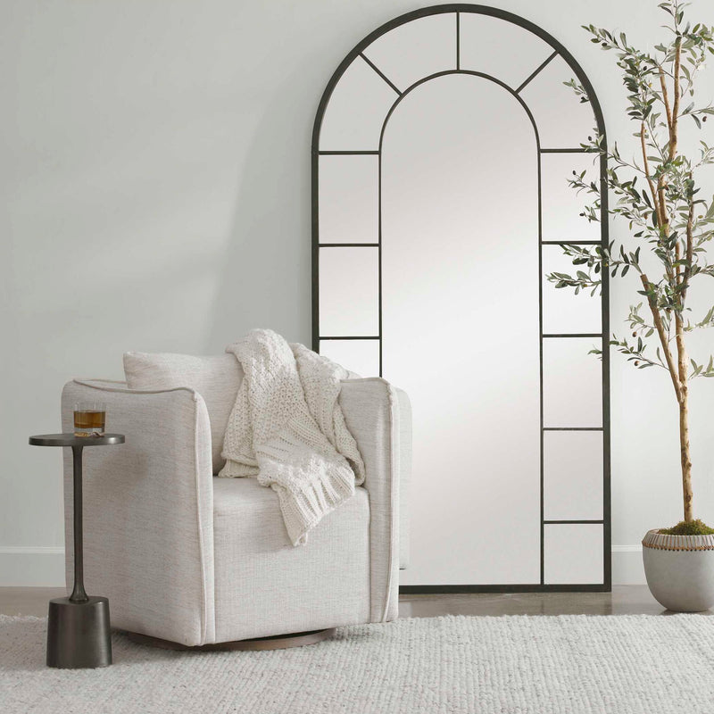 Silver Corben swivel armchair by Uttermost featuring a modern design and plush upholstery.