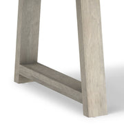 Simpli-Home Whitley dining table with wooden finish, rectangular shape, and sturdy legs for modern dining room setting.