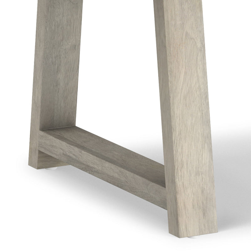 Simpli-Home Whitley dining table with wooden finish, rectangular shape, and sturdy legs for modern dining room setting.