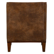 Dark brown leather armchair by Uttermost, featuring plush cushioning and stylish armchair design for living room comfort.