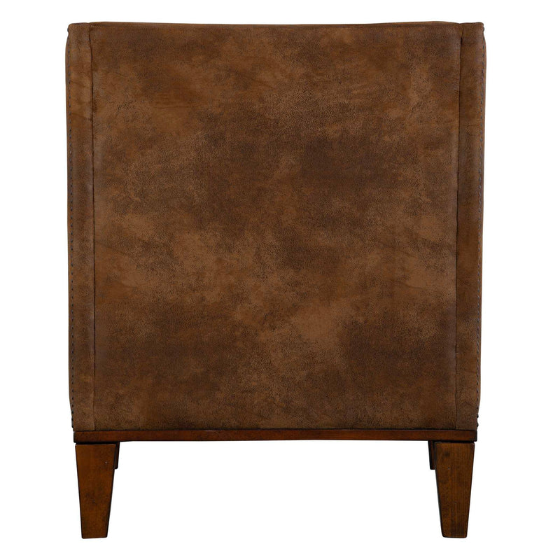 Dark brown leather armchair by Uttermost, featuring plush cushioning and stylish armchair design for living room comfort.
