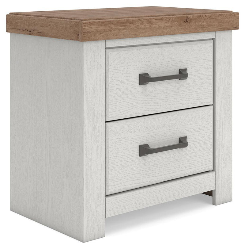Benchcraft white and brown two-drawer nightstand with built-in charging station, modern design, and sleek finish.