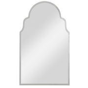 Uttermost Brayden Arch Mirror in nickel finish, wall-mounted with a sleek, curved design reflecting modern elegance.