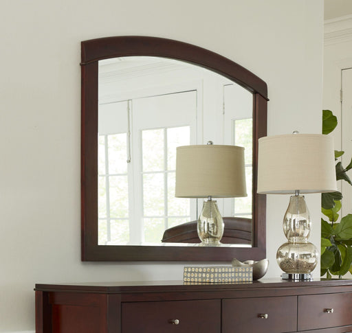 Modus Brighton Mirror in cinnamon finish, standalone decorative wall mirror with a warm, rich cinnamon-colored frame.