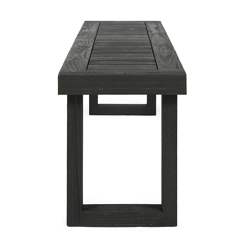 Noble House Realm outdoor bench with dark gray slat panel top and base, ideal for garden or patio seating.
