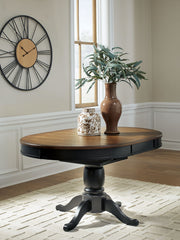 Clorazi - Oval Dining Room Butterfly Extension Table - Black / Brown - R&R Furniture Gallery (Fountain Valley, CA)