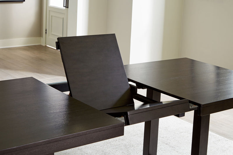 Neymorton - 7 Pc. - Rectangular Extension Table, 6 Side Chairs - Dark Grayish Brown - R&R Furniture Gallery (Fountain Valley, CA)