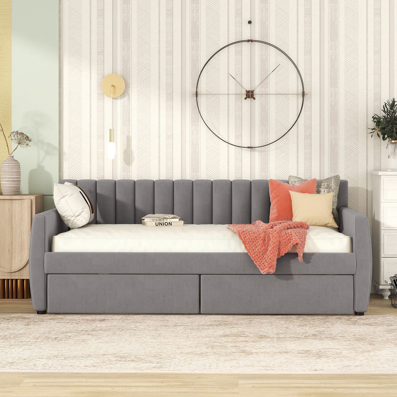 DreamHaus upholstered storage daybed with slat support, featuring a soft fabric-covered frame and built-in under-bed storage drawers.