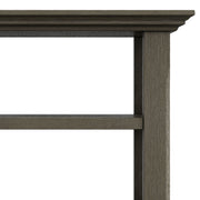 Handcrafted Acadian end table by Simpli-Home with a rustic wooden finish and sturdy legs, perfect for living room decor.