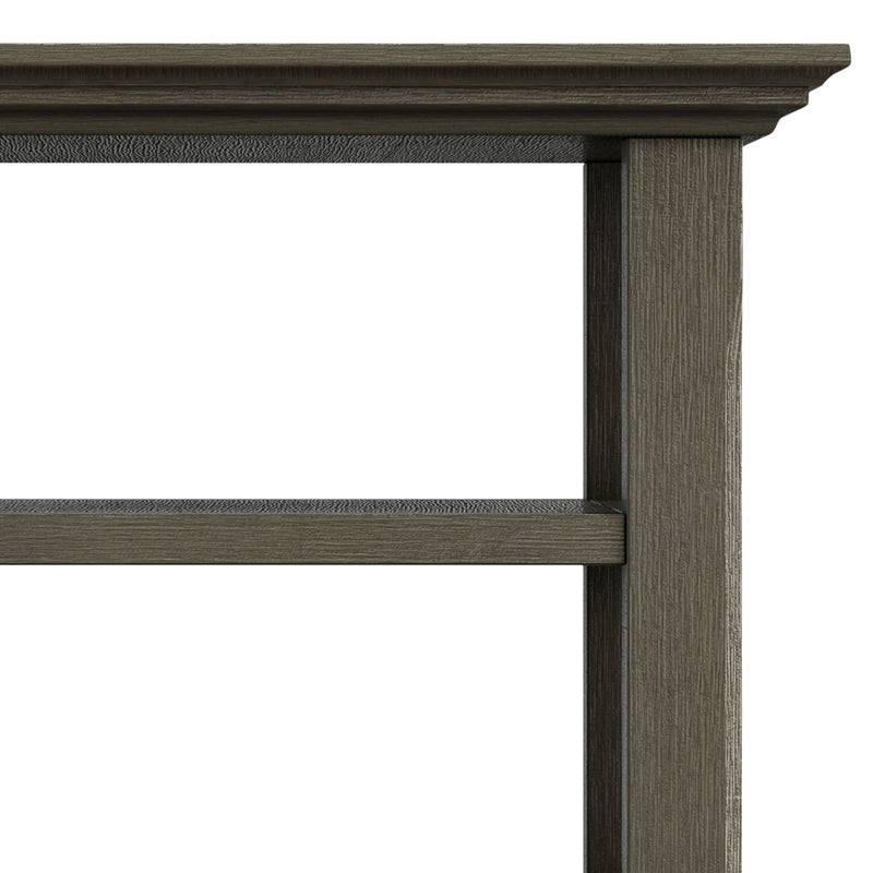 Handcrafted Acadian end table by Simpli-Home with a rustic wooden finish and sturdy legs, perfect for living room decor.