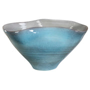 Blue Crest ceramic bowl by Uttermost, round blue plate with a glossy finish, perfect for serving or decorative use.