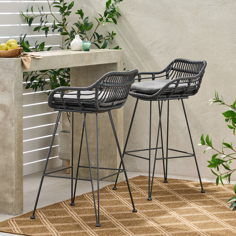 Noble House outdoor rattan bar chair with metal legs, part of a stool set, featuring woven rattan seat and sturdy metal frame.