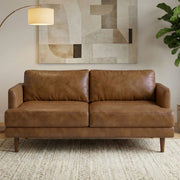 Simpli-Home Livingston upholstered stationary sofa with plush cushions and fabric upholstery in a modern living room setting.