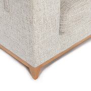 Classic Home Donovan stationary sectional sofa with plush cushions and neutral fabric, shown in a modern living room setting.