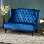 Noble House upholstered loveseat with wing back design and diamond tufting, featuring plush cushions and elegant fabric.