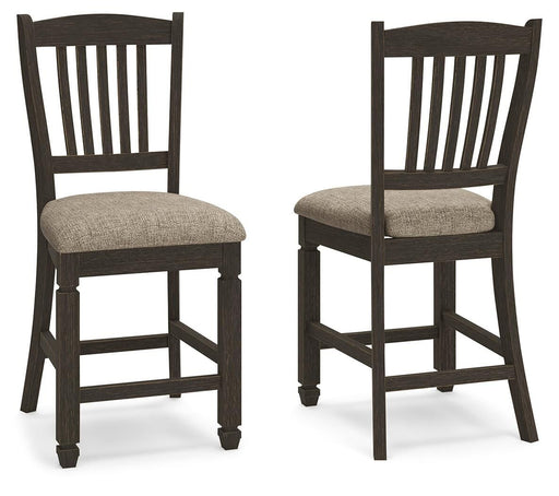 Set of two Signature Design by Ashley Tyler Creek upholstered barstools with black and grayish brown fabric, featuring padded seats and backrests.