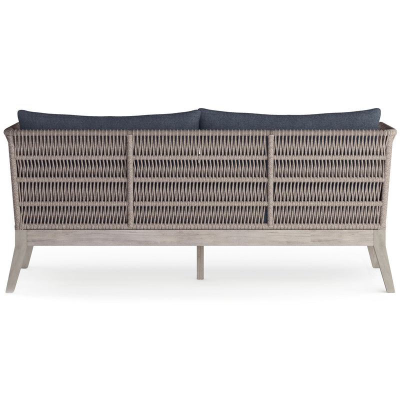 Slate gray outdoor sofa from Simpli-Home Santiago collection with cushioned seating and armrests, ideal for outdoor lounging.