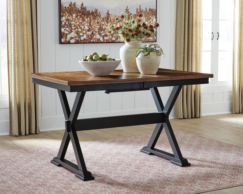 Wildenauer dining room extension table by Signature Design Ashley, showcasing a sleek counter table with extendable surface and modern style.