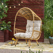 Noble House outdoor wicker standing basket chair with cushion, accent furniture for patio or garden sitting area.