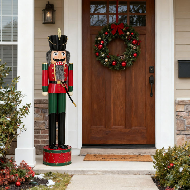 Noble House Classic Nutcracker Christmas decor in green and red, festive holiday decoration with detailed carved wood design.