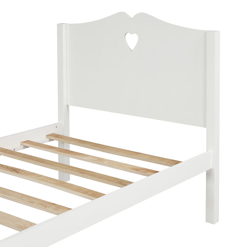 DreamHaus platform bed with slat support, headboard, and footboard shown in a sleek, modern bedroom setting.