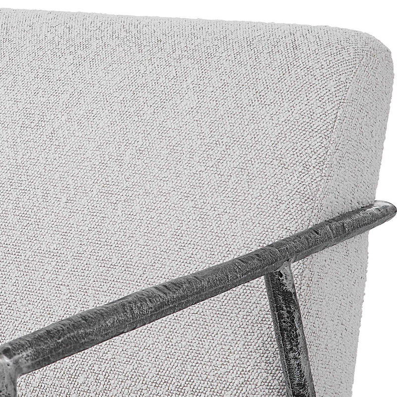 Uttermost Brisbane light gray accent chair with modern design and plush upholstery, suitable for living rooms or bedrooms.
