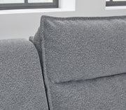Reclining sectional sofa in salt and pepper fabric by Signature Design by Ashley, featuring multiple reclining seats and plush cushions.