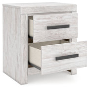 Cayboni - Two Drawer Night Stand - Whitewash - R&R Furniture Gallery (Fountain Valley, CA)