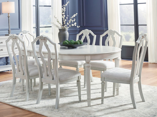 Benchcraft Montelaine 6-piece dining room extension table set with matching chairs, showcasing a stylish wood finish and elegant design.