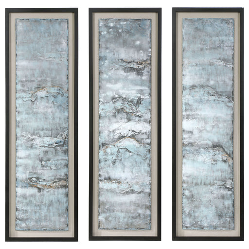 Set of three blue painted metal wall decor art pieces by Uttermost, featuring ocean-inspired abstract wave designs.