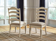 Realyn - Dining UPH Side Chair (Set of 2) - Ladderback - Chipped White - R&R Furniture Gallery (Fountain Valley, CA)