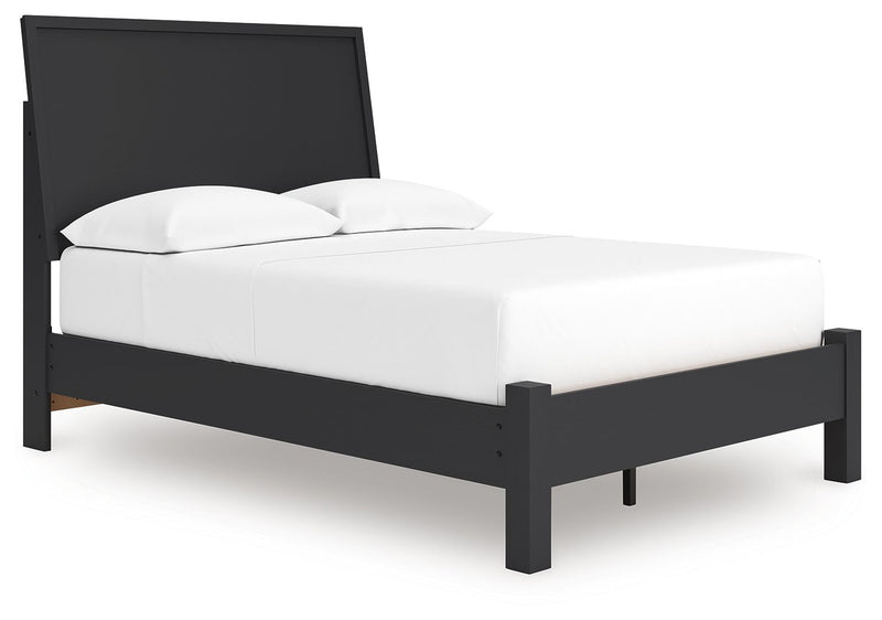 Signature Design by Ashley Danziar panel bed with low footboard, showcasing a modern wooden bedroom furniture piece.