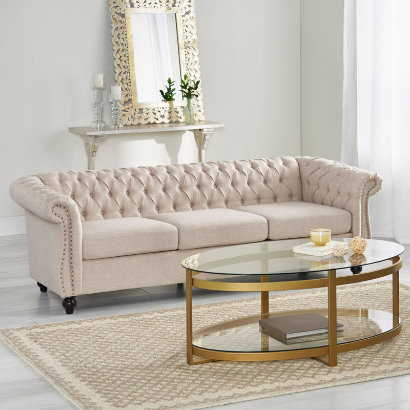 Noble House Chesterfield style 3-seater sofa with deep button tufting and classic stationary design, upholstered in luxurious fabric.