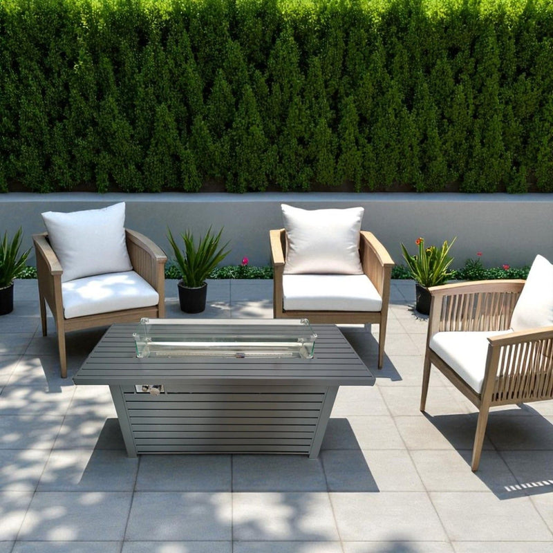 Gray outdoor gas fire pit table by LSI Patio Furniture with durable construction and lid, ideal for outdoor heating and ambiance.