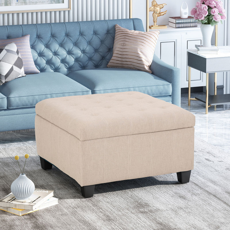 Noble House Isabella contemporary storage ottoman with padded top and wooden legs, ideal for living room seating and storage.