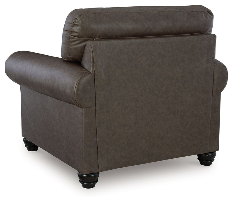 Benchcraft Roxmere living room set featuring a stationary chair and ottoman with plush upholstery and modern design.
