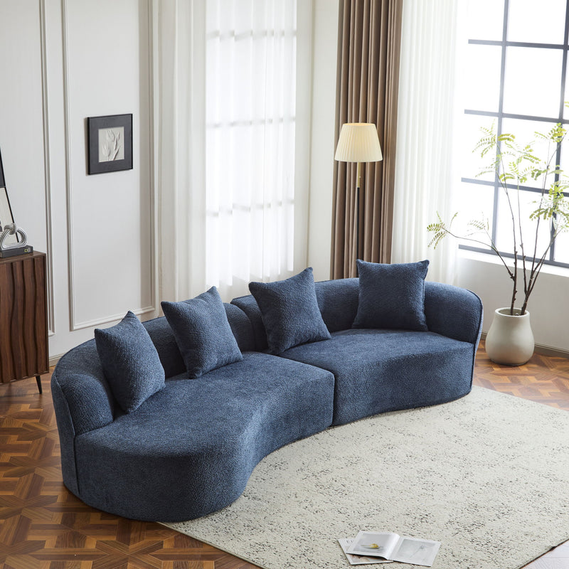 Elegant curved sectional sofa by Noble House with plush foam cushions, perfect for stylish, comfortable stationary seating.