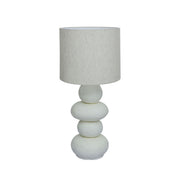 TOV Furniture Pebble Papier Mache Table Lamp with rounded, textured beige surface and modern design.