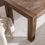 Classic Home Glendale dining table in toasted chestnut finish, showcasing a sturdy wooden surface and contemporary design.